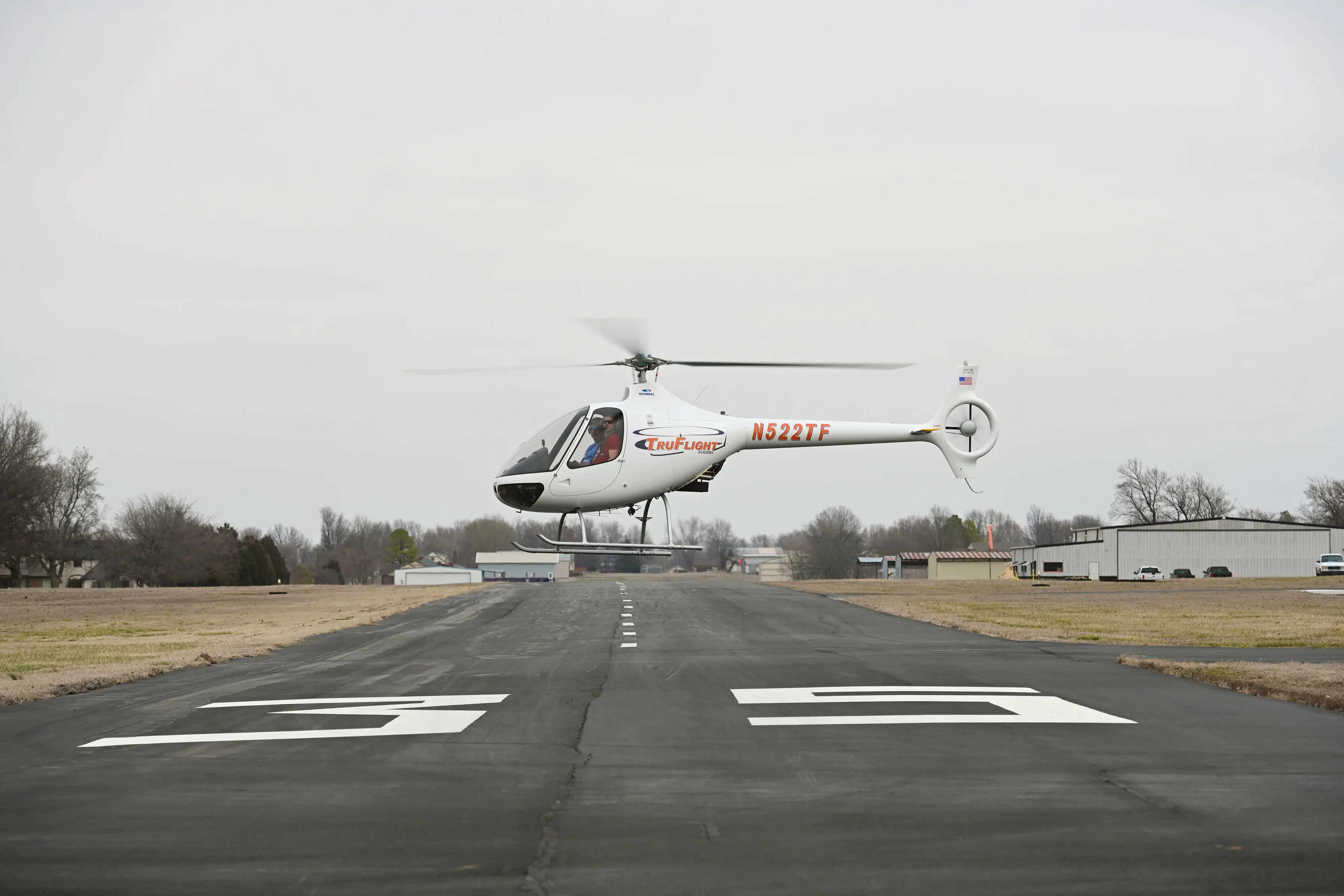Commercial pilot student flying a Cabri G2 helicopter
